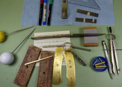 Knife blank and handle materials on work bench