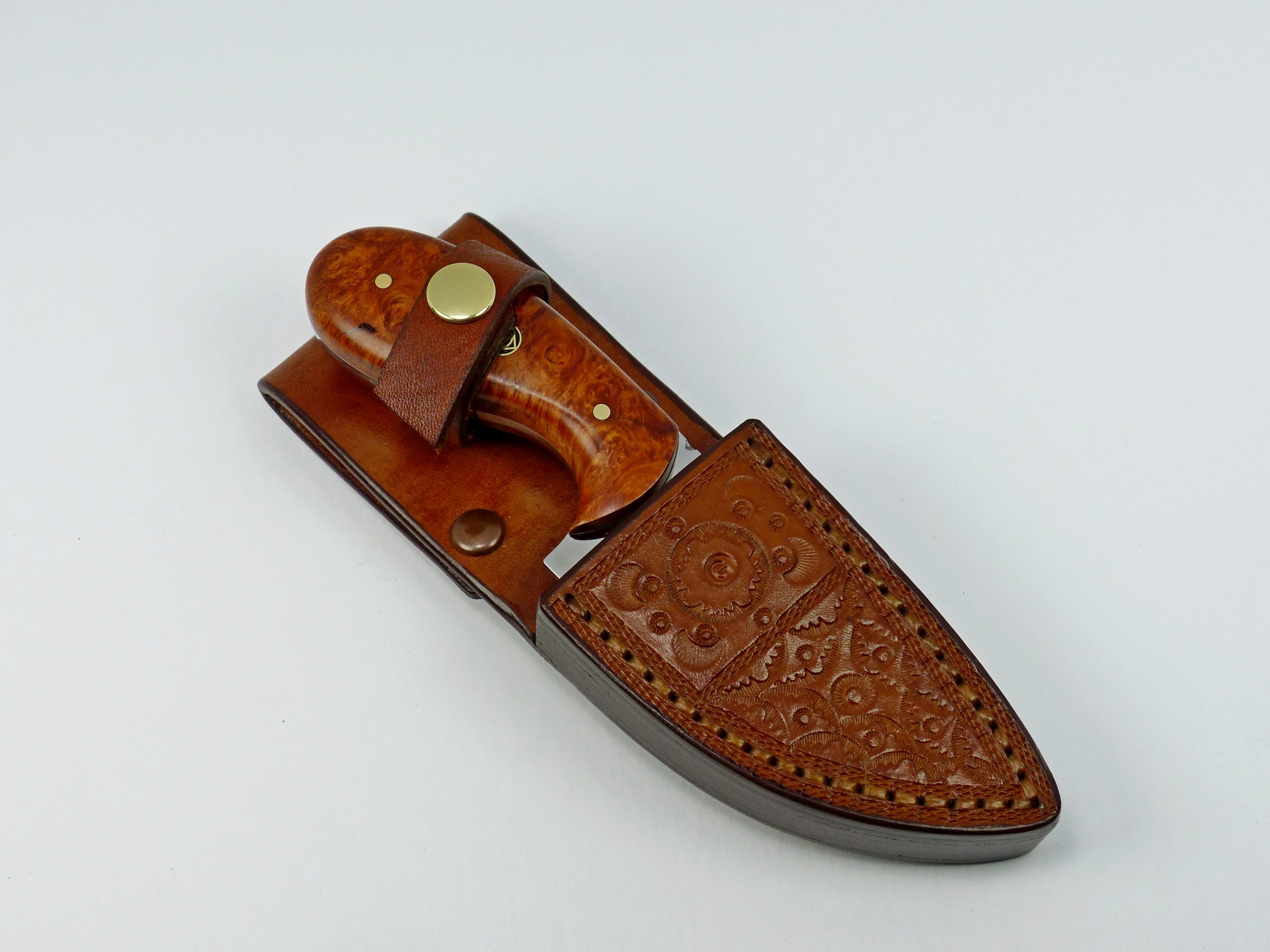 Burled Elm Palm Skinning Knife inside handmade leather sheath