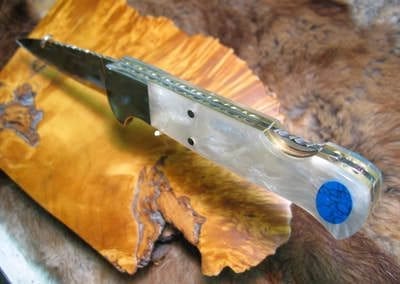 Brass fileworked liners on folding knife