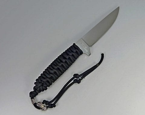 P1 Multipurpose knife inside custom fitted leather sheath