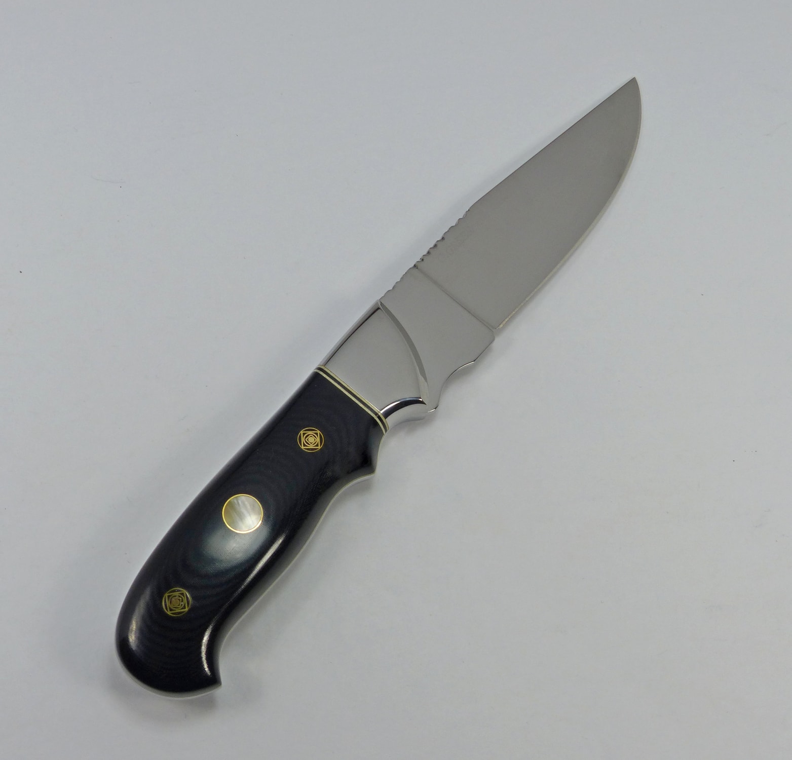 Black Linen Micarta knife with pearl polymer inlays, silver bolsters and filework