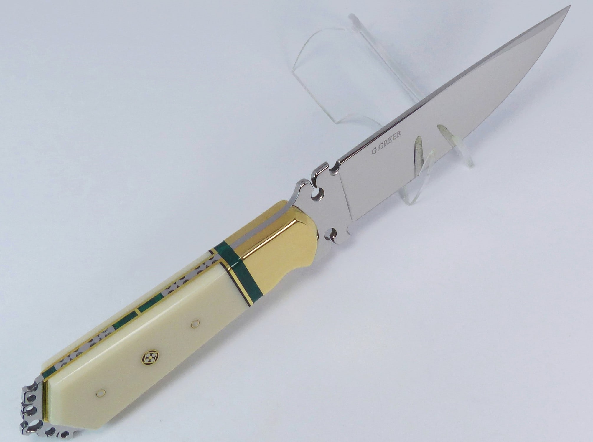 Ivory Corian collectors knife with malachite inlays inside fancy fileworked tang