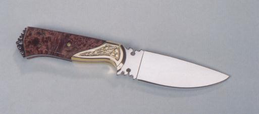 Collectors knife with sculptured bolster