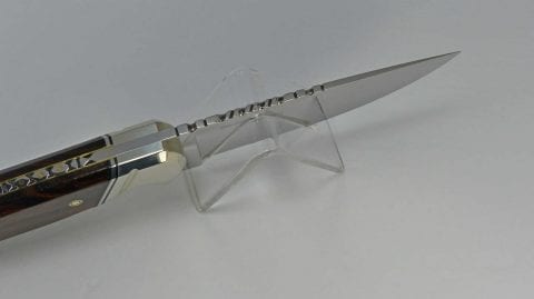 Hand filed spine of collector knife