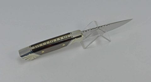 Arizona Desert Ironwood handle with nickel silver bolsters and filework