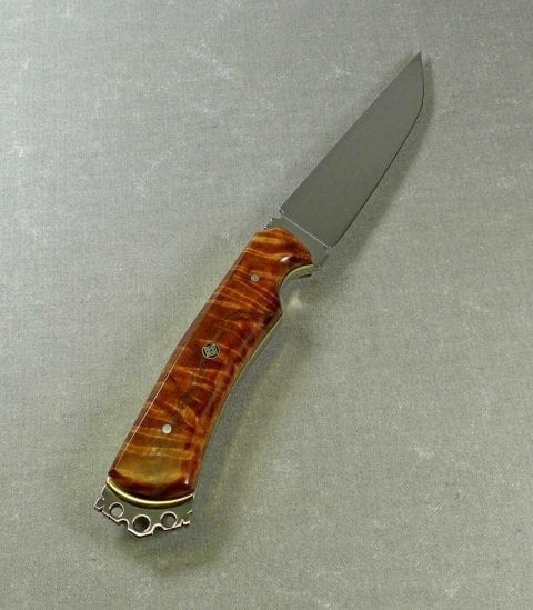 Sculptured crown on flame maple handle art knife