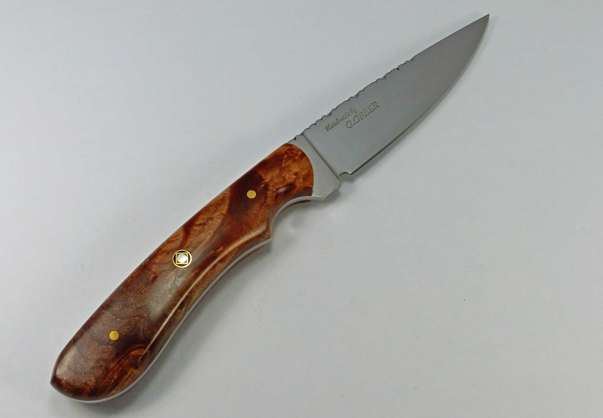 Great two-toned brown figured maple sportsman knife with drop point blade