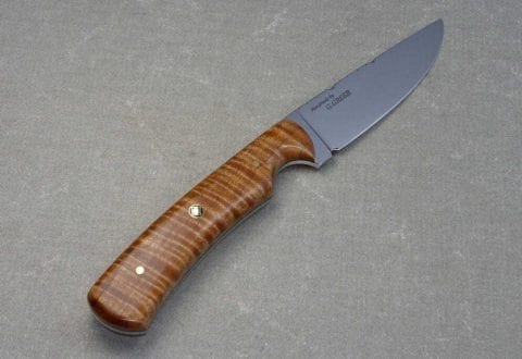 Light brown flame maple hunting knife with mirror polished drop point blade