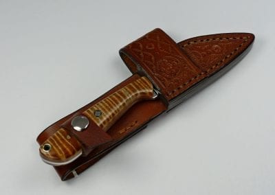 Beautiful brown EDC knife inside unique cross draw sheath