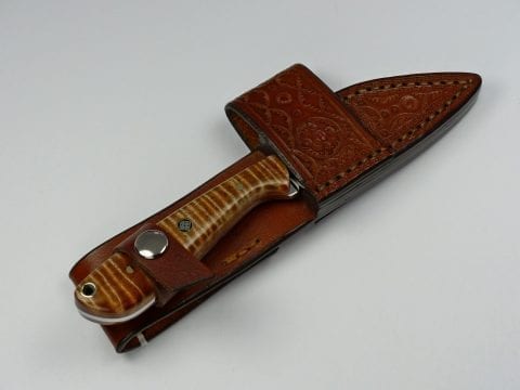 Beautiful brown EDC knife inside unique cross draw sheath