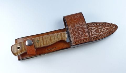 E7 Brown EDC knife inside handmade leather cross draw sheath