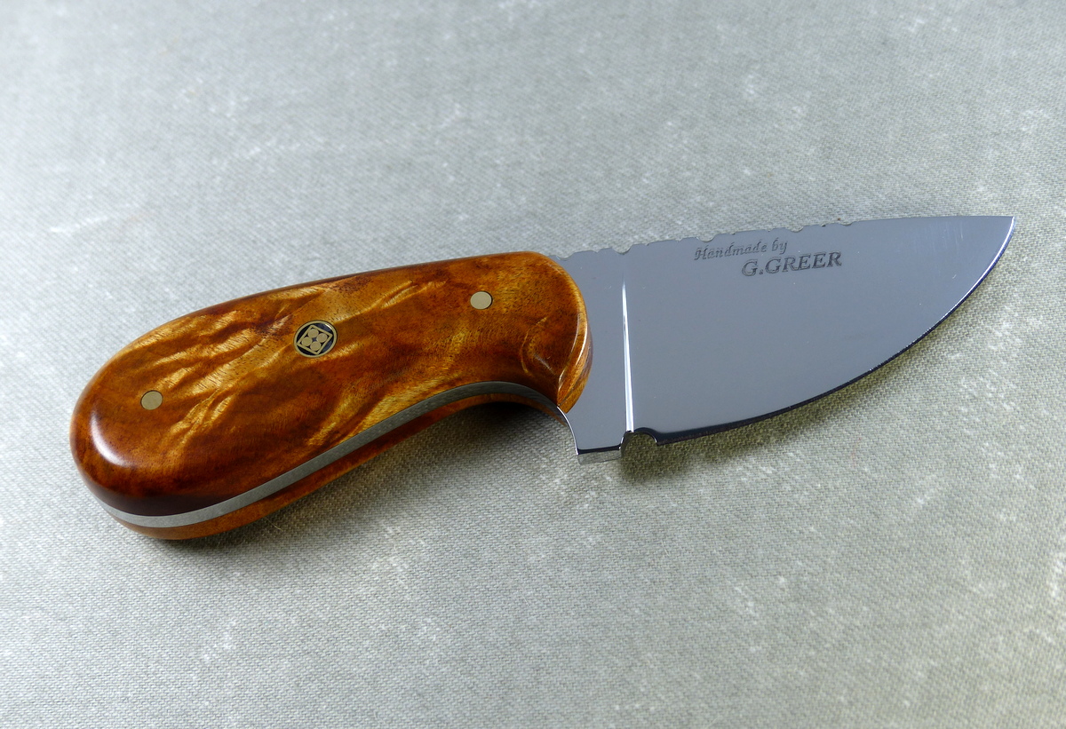 Small light brown palm skinner knife