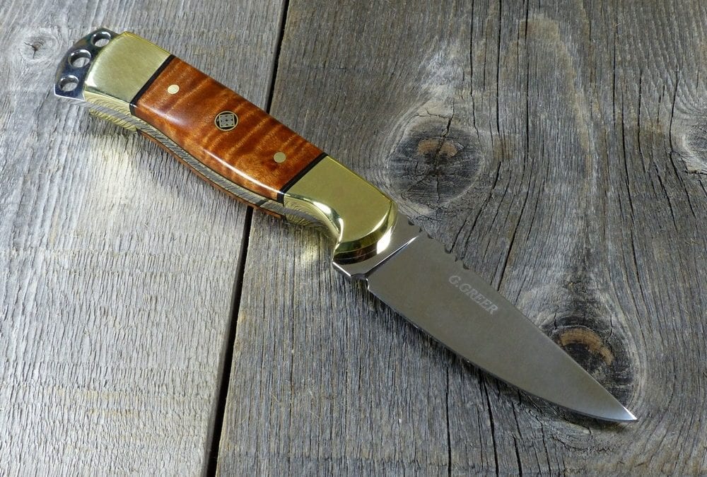 Fancy EDC knife with flame maple handle and brass bolsters