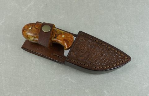 W36 Palm Skinner Hunting Knife inside handmade leather sheath