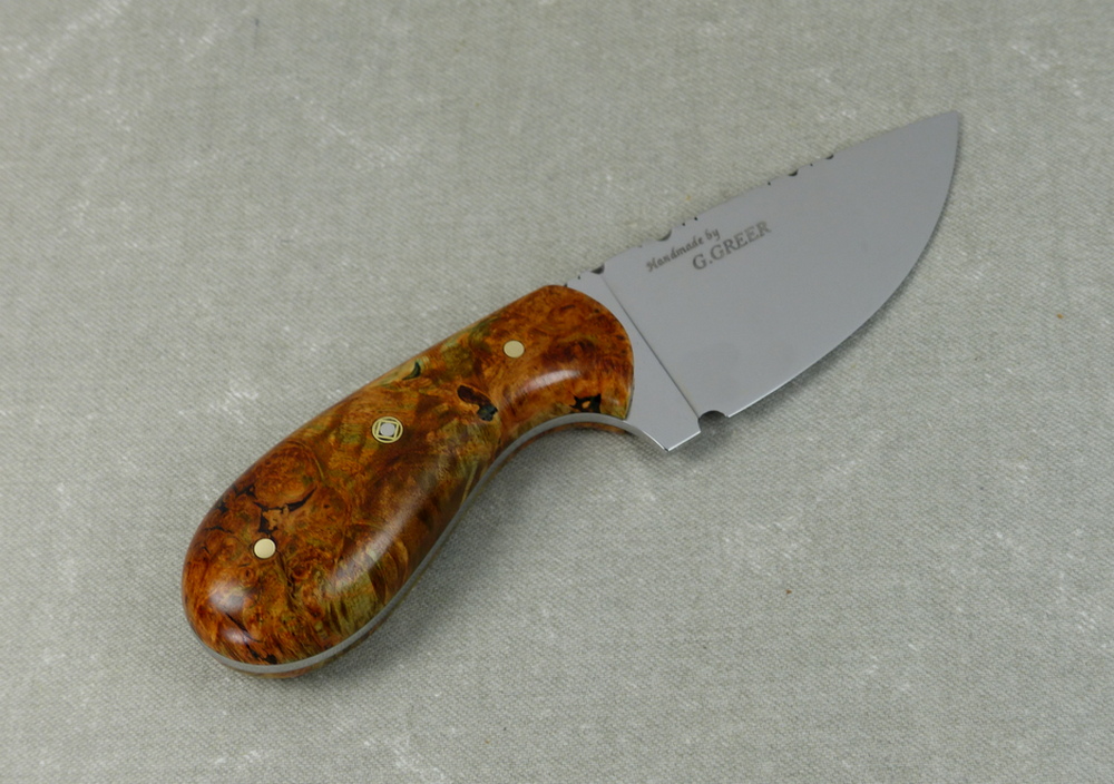 W36 Top view of burled elm palm skinner