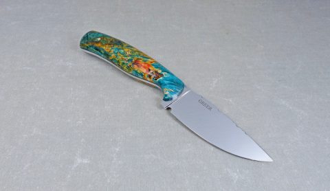 Side view of colorful maple hunting knife